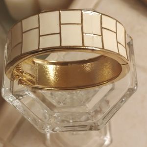 Vintage white enamel gold tone hinged bangle